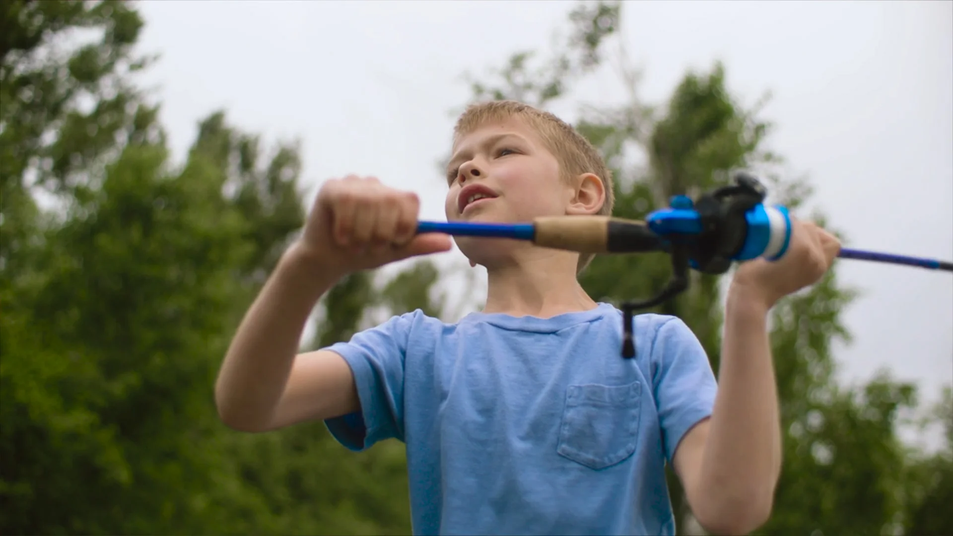 A child casting a fishing rod at a hatchery fishing pond (described from the image's file name and its position beside the Learn to Fish section; the page publishes no alt text).